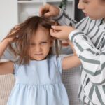 Young slim woman enjoys weight loss result